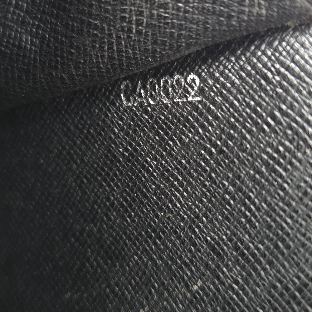 Authentic Louis Vuitton Taiga Selenga clutch
